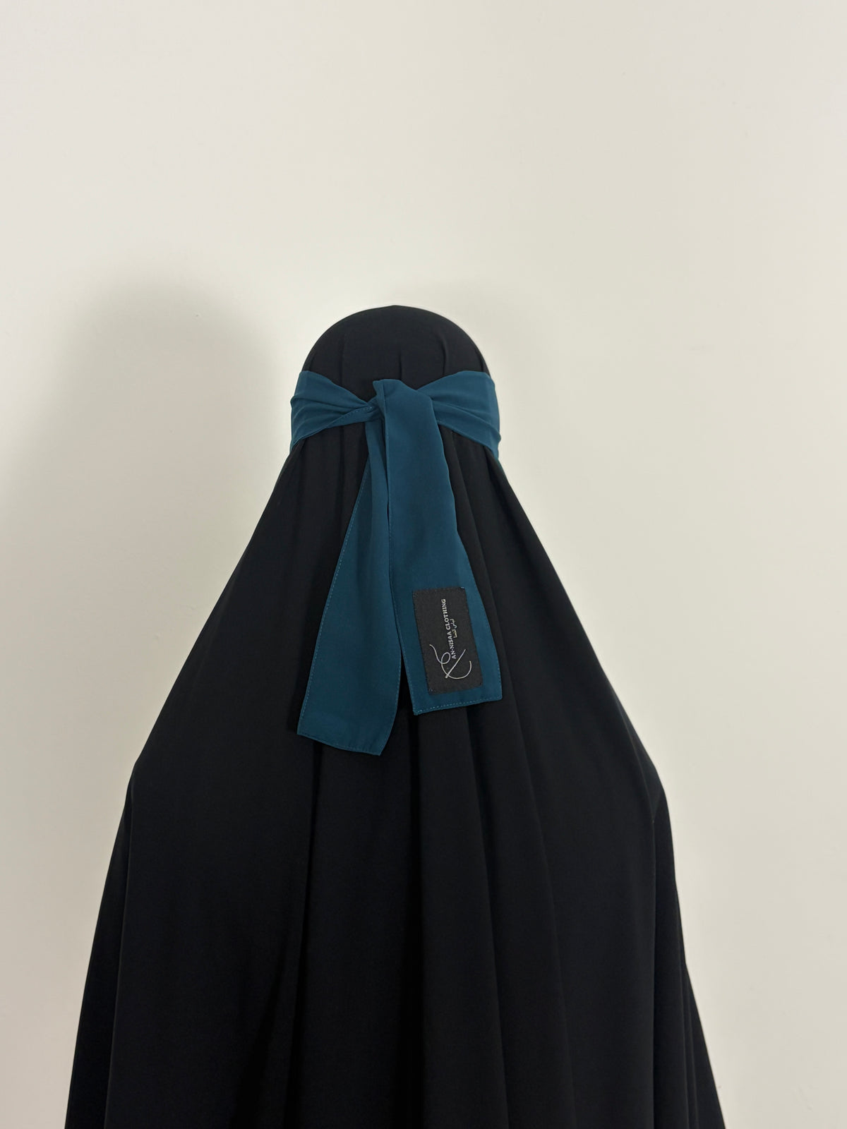 Teal nose string niqab